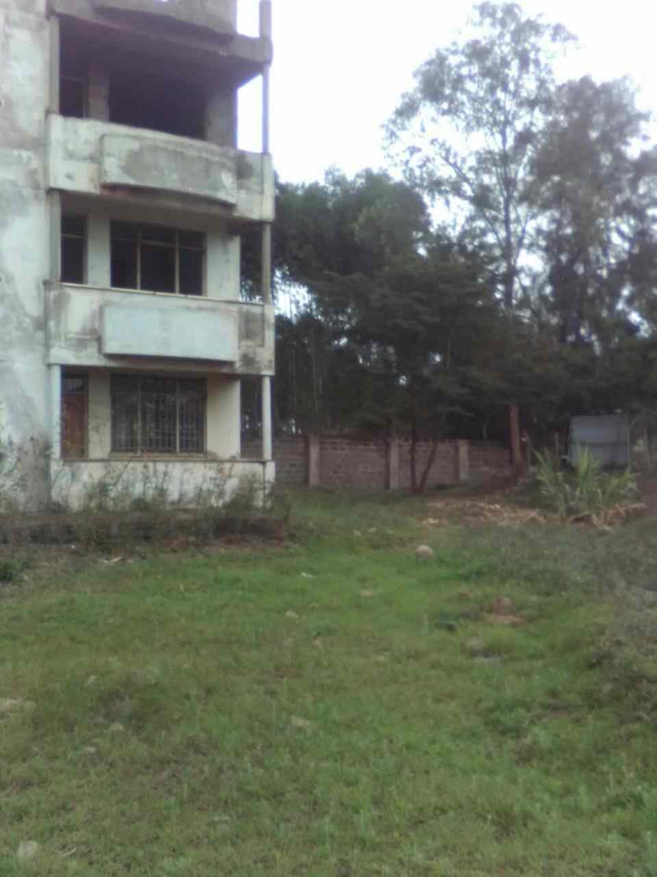 2 acre land with apartments for sale in Juja