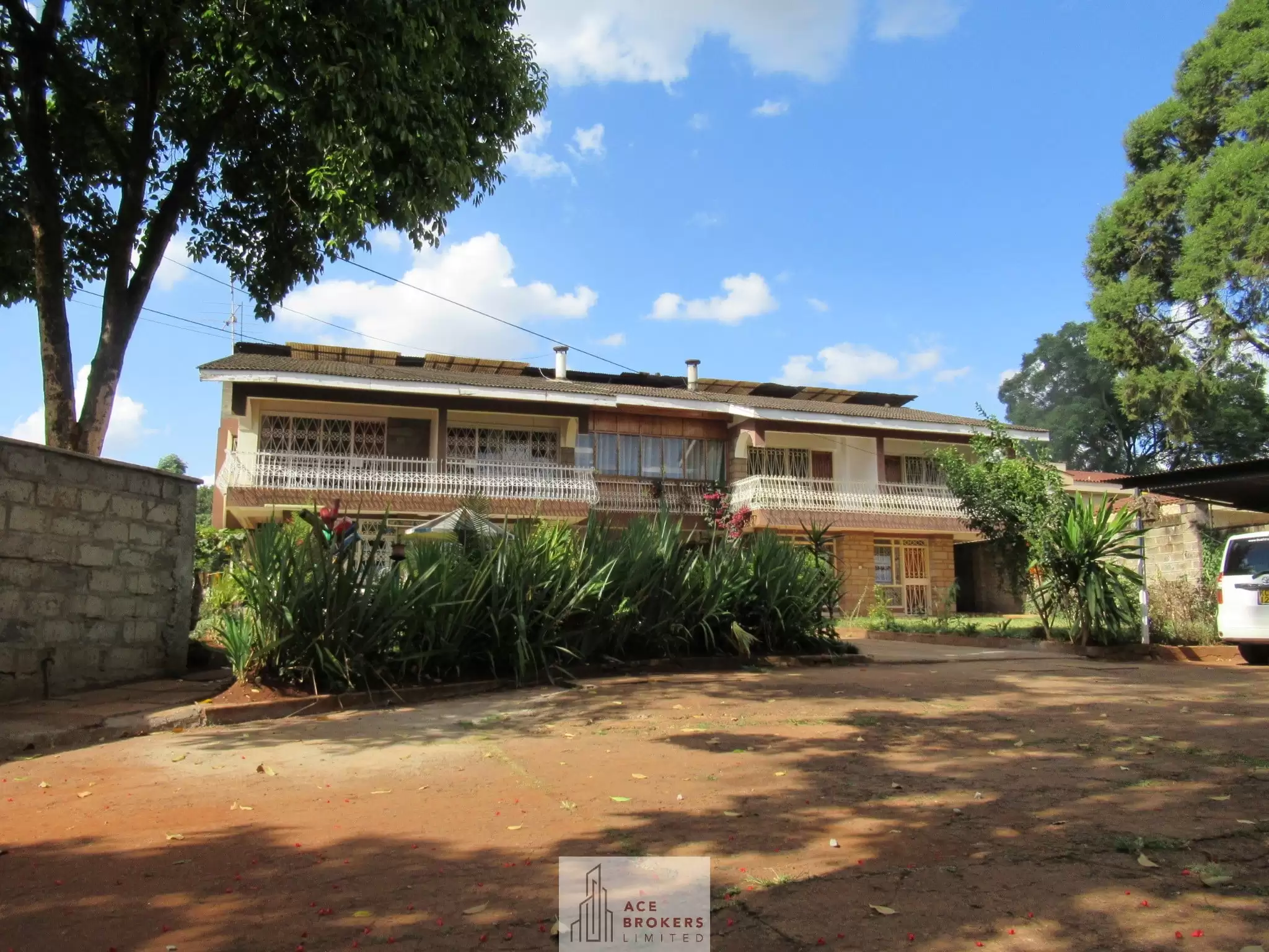 0.45 acre plot with house for sale along Lower Kabete road Image