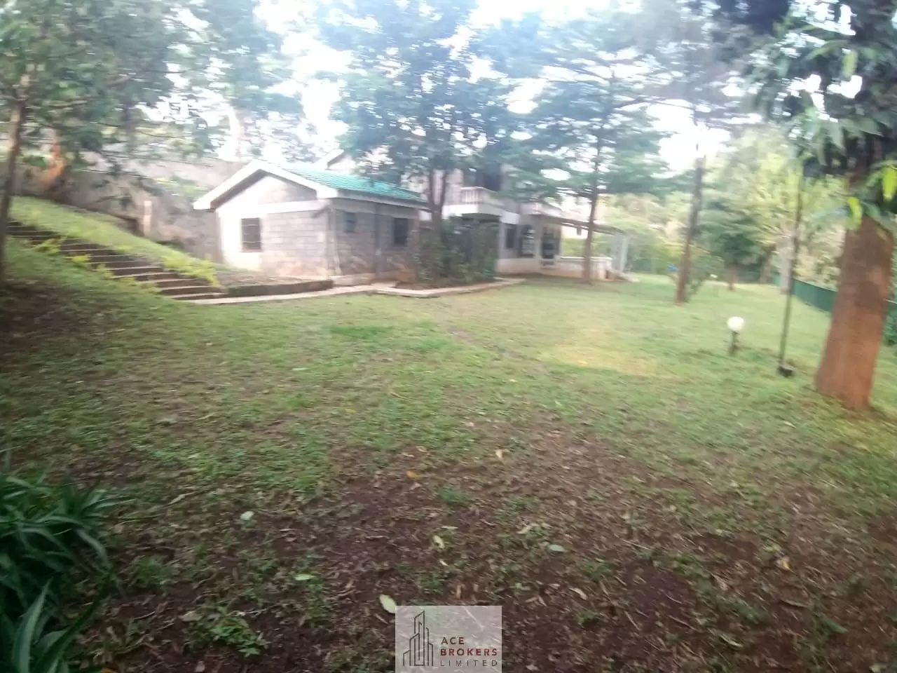 1 acre land with house for sale in Nyari Image