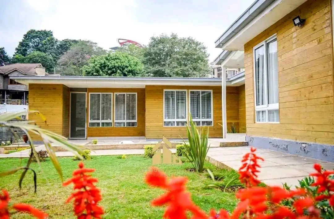 A marvelous wooden 4 bedroom bungalow to let in Spring valley. Image